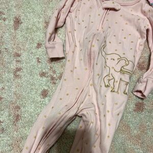 12 months. Carter’s. Footie pajamas. Zip up. Used condition.